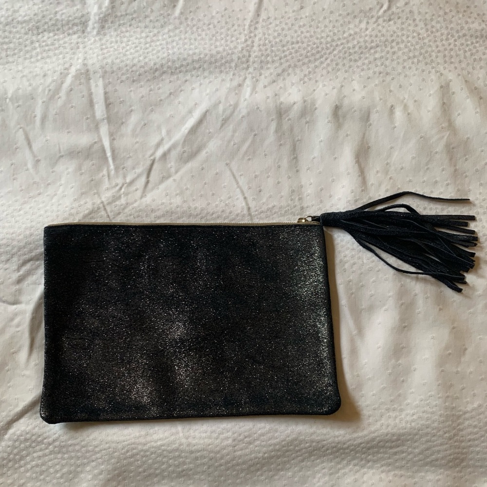 Navy blue suede clutch from Calypso St. Barth x Monserat De Lucca